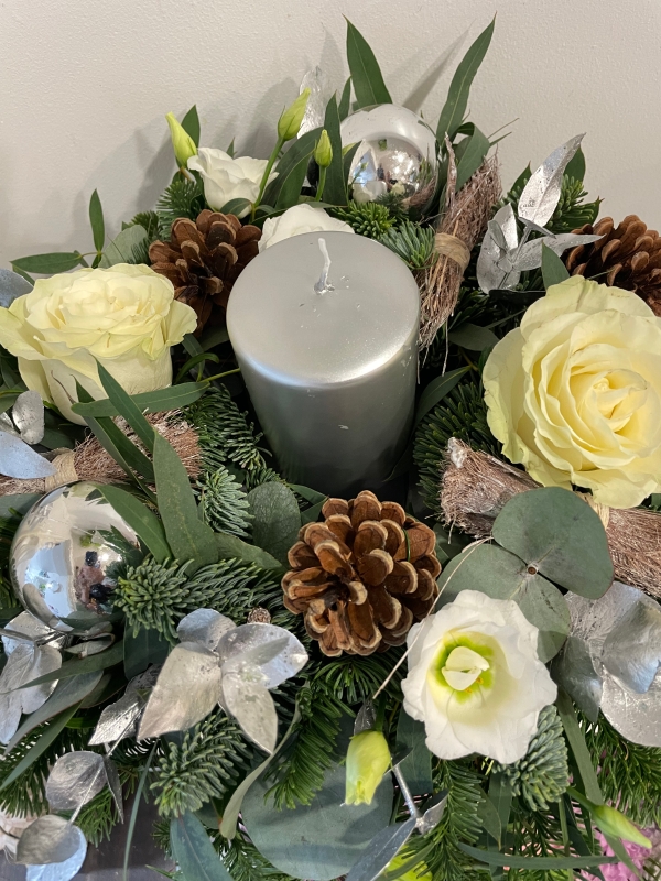 Christmas table centre white and silver with silver pillar candle