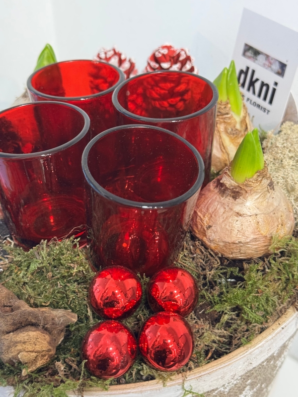 Round basket Hyacinth planted table centre with t light holders