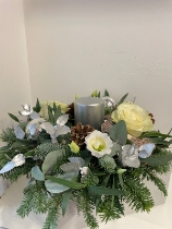 Christmas table centre white and silver with silver pillar candle