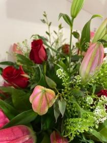 Pink Lily and Red Rose hand tied bouquet