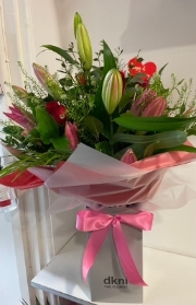 Pink Lily and Red Rose hand tied bouquet